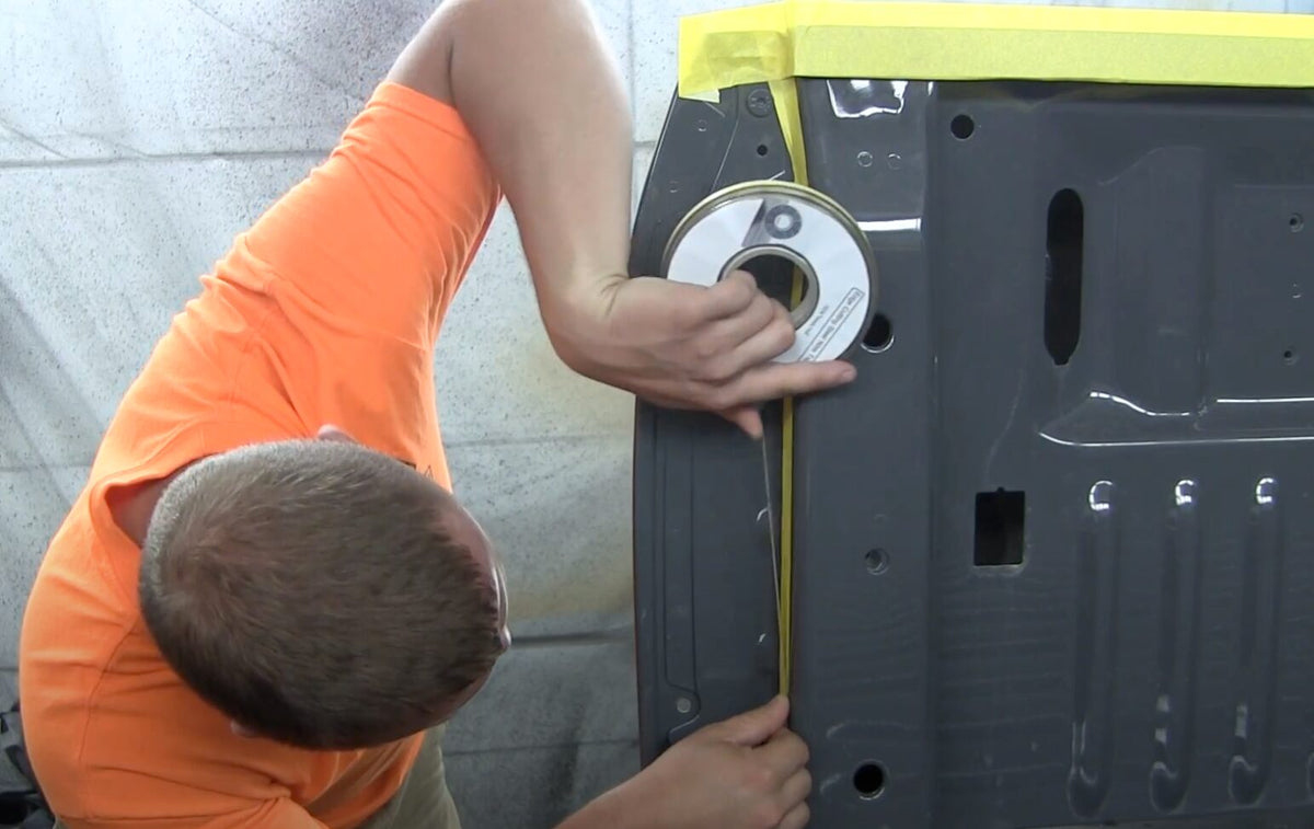 vehicle protective coating edge cut with trim tape